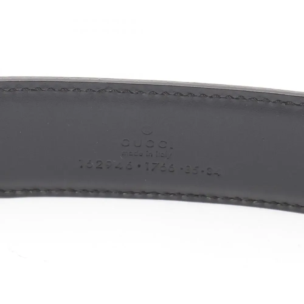 Gucci Black Embossed Leather Belt with Gold-Tone Buckle